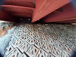 Interlocking concrete blocks installed under steel frame structure