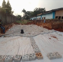Interlocking concrete blocks being laid on site