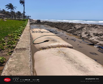 Geotubes deployed along a coastal beach for shoreline protection